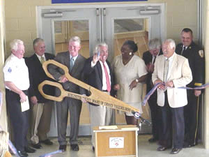 Ribbon Cutting (left to right) Dick Archer, David